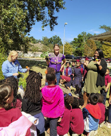 Fran Martin with teachers and students.